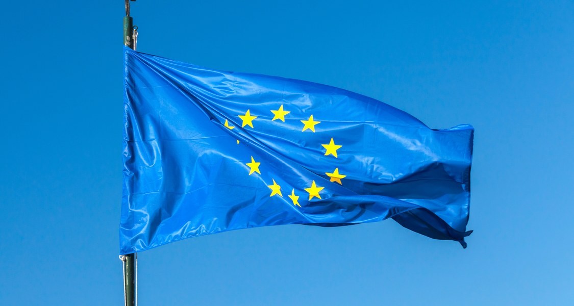 Flag of the EU on a Flagpole in the wind