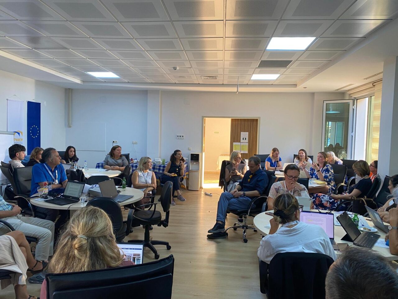 The cross-WP participants working in groups.