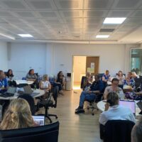 The cross-WP participants working in groups.