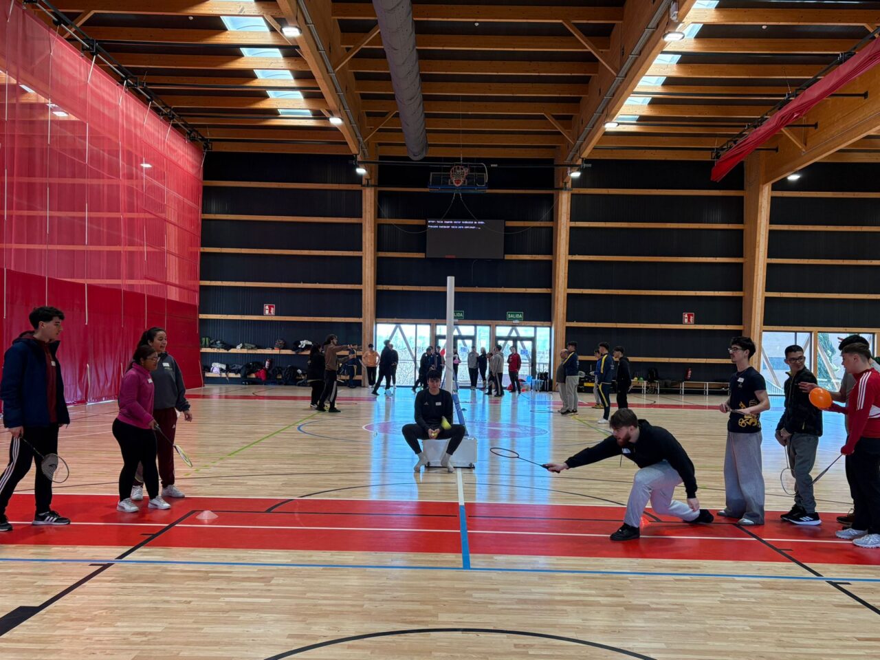 Students practicing inclusive badminton.