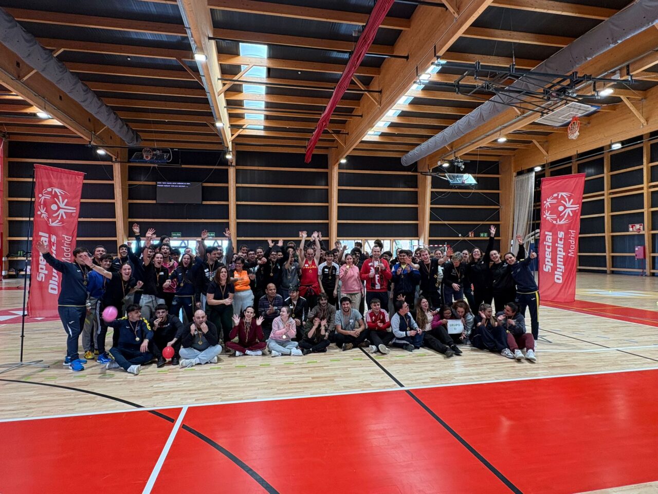 Students working in groups in a classroom.