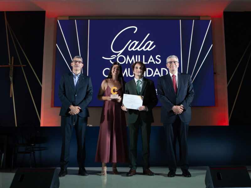 Student from the EUPeace Comillas Club receives the Most Committed Student Association award on stage at the IV Comillas Community Gala.
