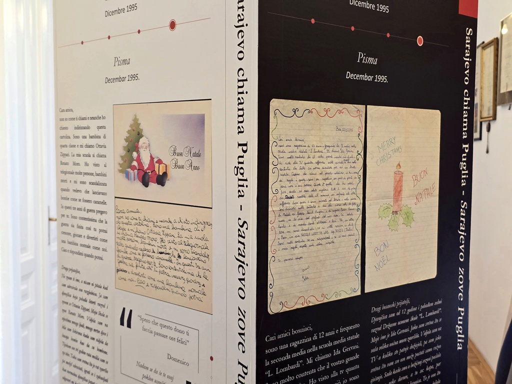 One of the information pillars from the exhibition with images and texts.