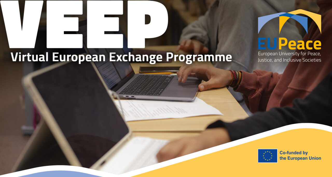 Close-up of several students working side by side at a wooden desk: hands on a laptop keyboard and trackpad, a tablet with a keyboard in the foreground and printed notes on the table. Large white letters at the top left read "VEEP" with the subtitle "Virtual European Exchange Programme". The EUPeace logo appears top right, and a yellow band at the bottom carries the "Co-funded by the European Union" emblem.