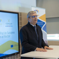 The Rector of Comillas standing, giving a speech about the Sarajevo Peace Declaration.