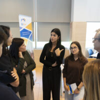 Students talking with the Rector in an informal conversation.