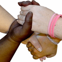 Four diverse hands holding each other in a circle.