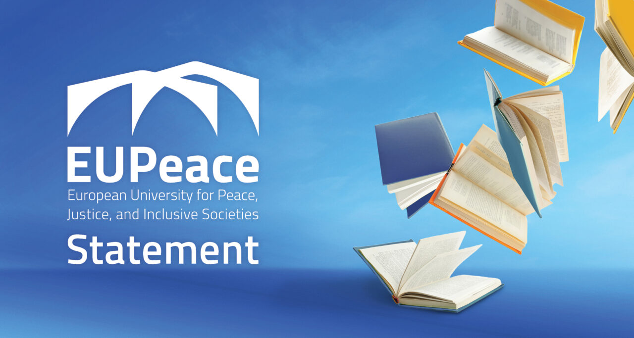 EUPeace logo with the word “Statement” beside several open books floating against a blue sky—header for the policy statement on academic freedom.