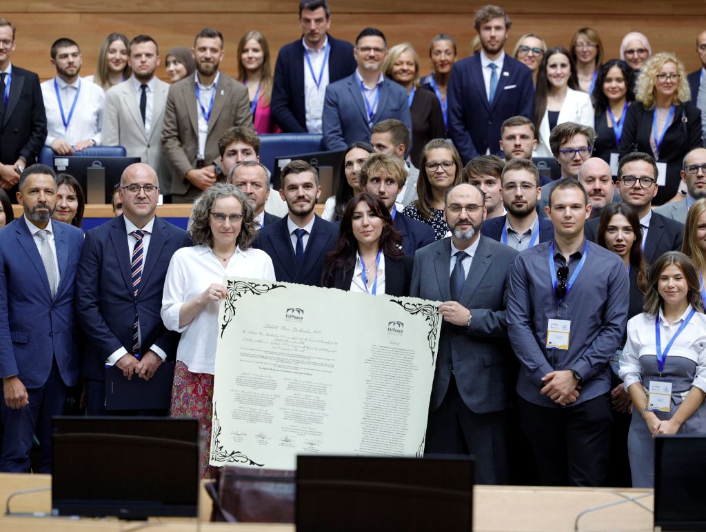 EUPeace students together with a diverse group of supporters.