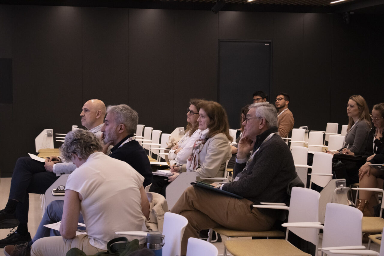 Audience seated in a conference room during an EnerPeace 2026 session at Comillas.