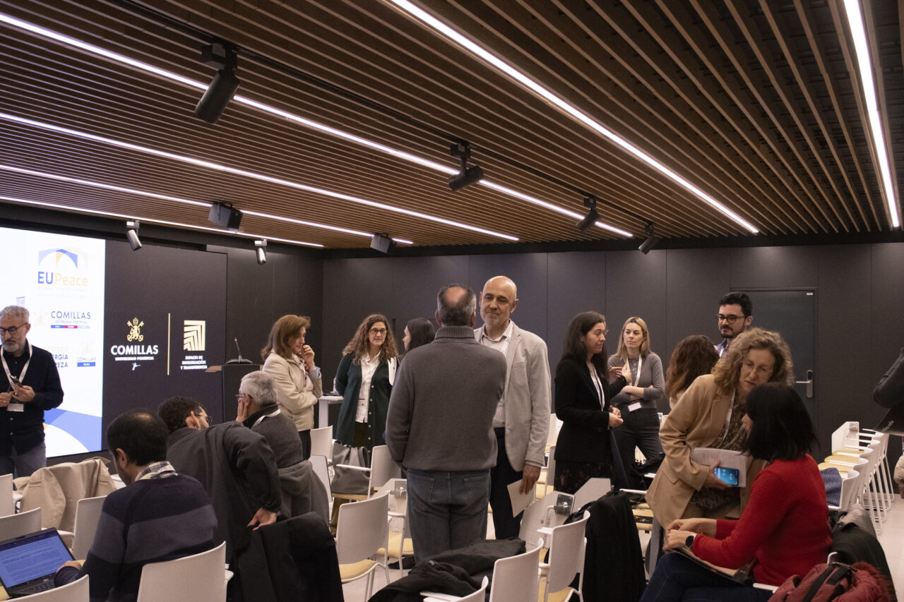 Participants standing and talking during a networking break at EnerPeace 2026.