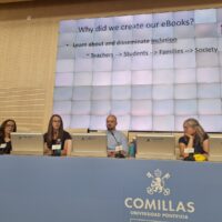 Panel of speakers at Comillas University presenting on eBooks and inclusion during an academic event.